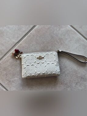 Coach White Embossed Signature Wristlet with Charm